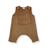 Flat lay of brown baby corduroy overalls with wide leg opening